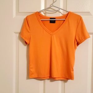 Soft stretchy v neck crop top light orange Olivia Rae